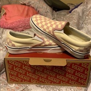 pink checkerboard slip on vans